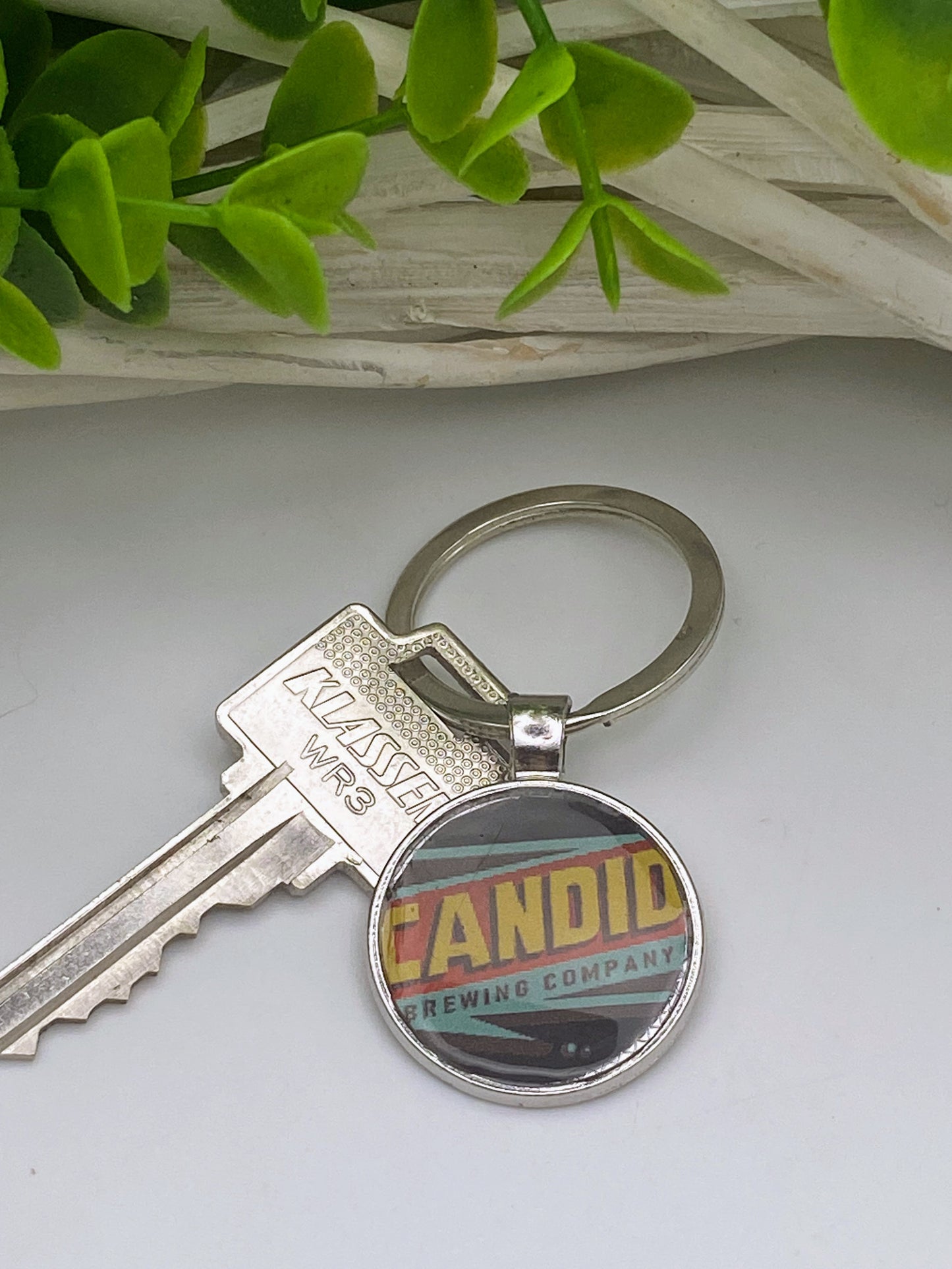 Candid & Big Spruce Brewing Keychain